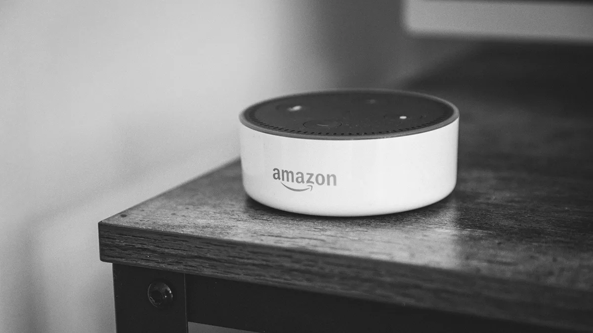 A black and white photo of Amazon Alexa